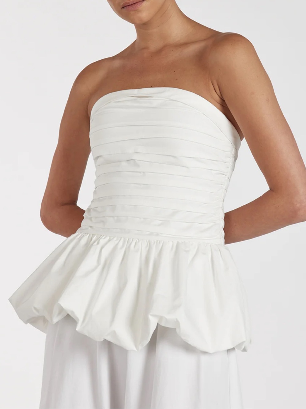 DISSH White Strapless Ruched Peplum Top